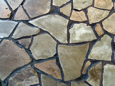 石墙背景构造材料灰色建造石质岩石砖墙建筑学褐色圆形图片