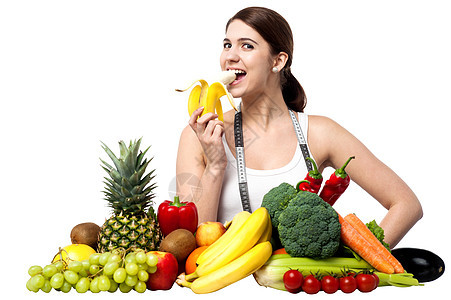 健康的食香蕉的caucasian健康女孩图片