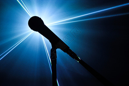 扩音器蓝色激光麦克风射线辉光唱歌人声音乐收音机黑色图片