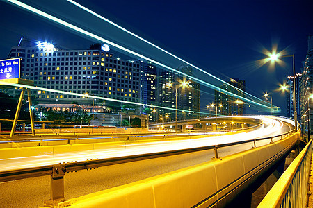 夜间城市地区旅行景观运动建筑运输路灯速度过境街道辉光图片