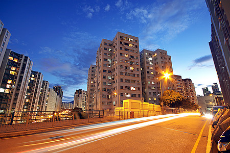 现代城市 晚上有高速公路交通 香港州康摩天大楼旅游隧道运输日落速度商业天空场景建筑图片