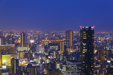 日本大阪的夜景商业景观办公室城市建筑物建筑学摩天大楼都市地标风景图片