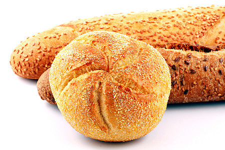 白色背景上孤立的新鲜面包早餐饮食面包师面团金子小麦糕点谷物工作室纤维图片