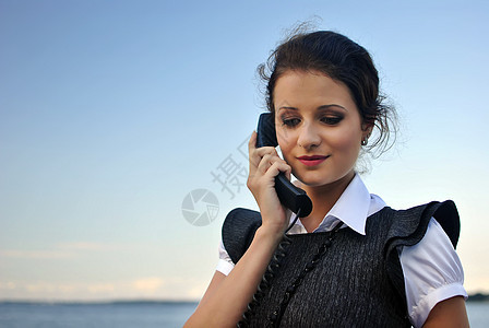 拥有电话接听器的女孩商业技术女士女性背景图片