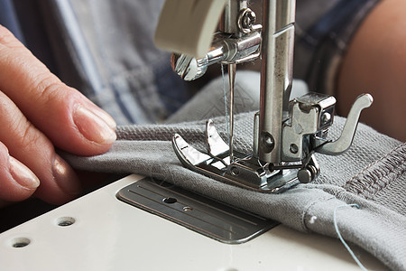 缝纫机针脚线程器具拼接裁缝金属缝纫宏观衣服纺织品图片