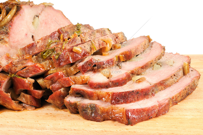 木板上的烤猪肉炙烤晚餐烧烤红色美食烹饪牛扒食物猪肉图片