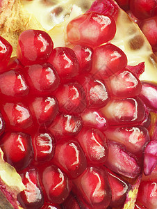 红色多汁 成熟的石榴树frui果汁石榴石粮食美食红宝石石榴食物植物花岗岩水果图片