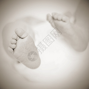 婴儿脚儿童医疗宏观粒状色调母性皱纹卫生新生粮食图片