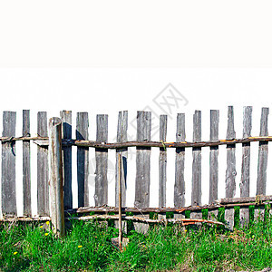 旧木板围栏杂草场景栅栏植物指甲风化垃圾农场牧场菜园图片