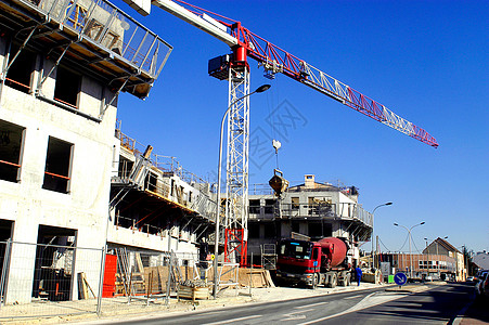 市区建筑工地房地产城市司机街道工人城市化卡车蓝色蓝领城市规划背景图片