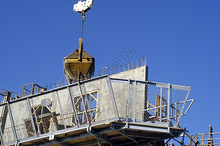 市区建筑工地房地产机器起重机工作蓝色卡车城市规划蓝领城市化住宅背景图片