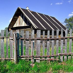 旧围栏城市植物学乡村风景木板蓝色栅栏木材阁楼杂草图片