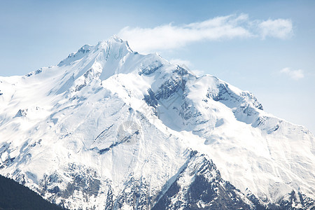 山上有高山季节蓝色滑雪板风景天空滑雪高度云杉全景冰川图片