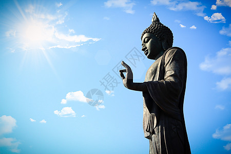 泰国漫走佛佛像雕塑扫管天空文化教会太阳纪念碑宗教雕像场景图片