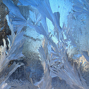 窗口上的冰水晶季节日出雪花气候玻璃冻结寒冷棕色结晶图片