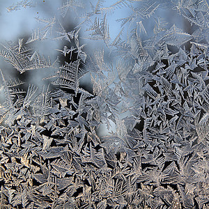 窗口上的冰玻璃窗户棕色寒冷羽毛水晶日出气候结晶温度图片