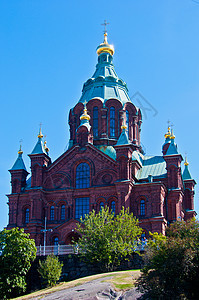 乌斯彭斯基大教堂遗产宗教教会红色城市地标晴天建筑圆顶图片