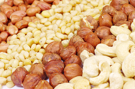 坚果小吃营养宏观种子饮食榛子核桃腰果棕色松子图片