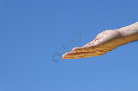 神之手掌心男人金子帮助蓝色要求乞丐棕榈辐射后盾图片