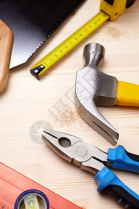 工具蓝色乐器工业统治者锤子修理木工金属黄色木头图片