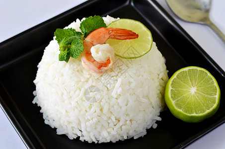 大米和虾虾午餐勺子食物生活烹饪盘子柠檬饮食餐厅营养图片