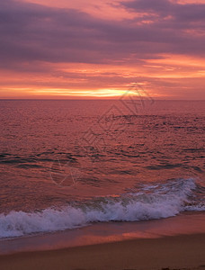 美丽的日落海景反射日出场景热带波纹天空摄影海滩涟漪图片