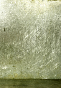 古老的土金金属银色材料拉丝耐用性线条中心盘子工业墙纸床单图片