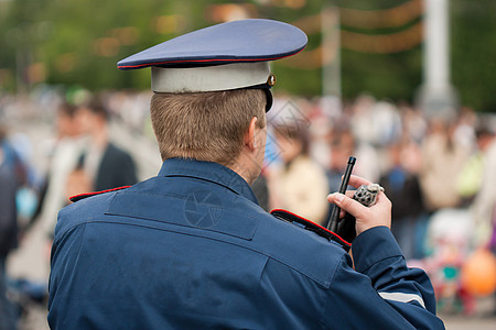 警察 警官男性车辆法律警卫城市街道监视帽子场景安全图片