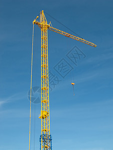 建筑起重机职业金属采摘吊装蓝色工程绳索机械黄色繁荣图片
