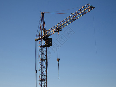 建造高塔起重机的金属建筑活动蓝色螺栓吊装建筑学机械就业机器生长繁荣图片