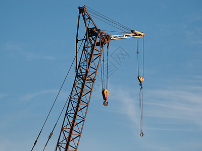 建筑起重机蓝色水泥机器吊装职业工人货物生长采摘工程图片