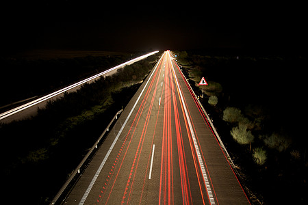 夜速高速公路汽车交通运输车道边缘速度延时旅行驾驶信号图片