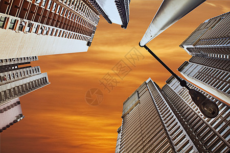 日落时的现代建筑背景图片
