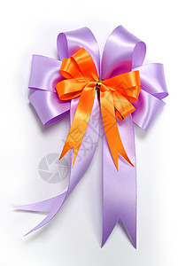 装饰礼品盒的漂亮的丝带弓手工生日新年奉献礼物购物蝶结紫色橙子图片