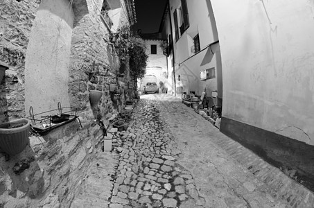 Umbria 的 Spello 建筑图环境街道历史性岩石历史艺术蓝色房子木头旅游图片