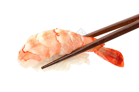 寿司加筷子服务海鲜螃蟹飞行美食宏观小吃食物鱼片晚餐图片