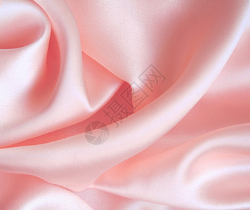 平滑优雅的粉色丝绸作为背景纺织品玫瑰曲线投标织物布料白色红色材料折痕图片