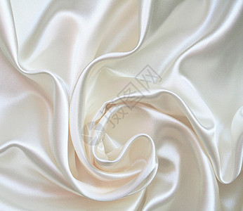 作为婚礼背景的平滑优雅白色丝绸新娘海浪折痕寝具银色纺织品织物布料材料曲线图片