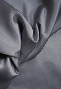 平滑优雅的灰色丝绸作为背景反光投标黑色织物布料寝具衣服材料版税涟漪图片