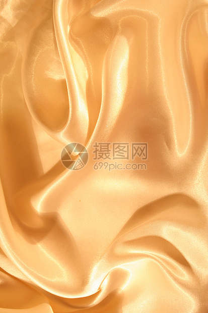 平滑优雅的金色丝绸背景图片