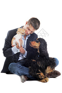 人和狗动物棕色犬类夹克黑色猎犬微笑男人工作室宠物图片