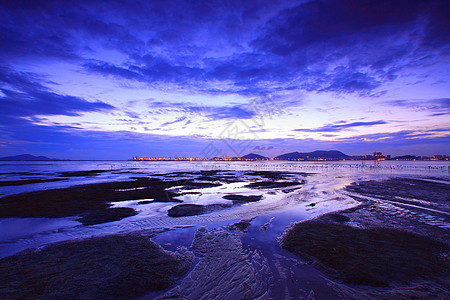 黄昏时 香港日落橙子海岸线太阳反射美化土地天堂积雨风景河口图片