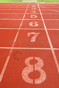 运动员赛跑轨道车道赛跑者红色椭圆形闲暇运动竞争竞赛课程绿色圆形图片