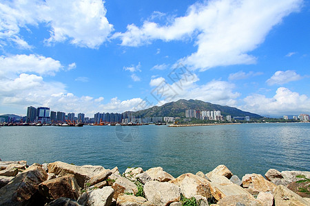 香港白天的沿海风景状况天气海岸线阳光旅游屯门日落假期旅行天空住宅图片