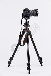 配有三脚架相机的照相机题材单反照片镜片三脚架专业黑色职业摄影图片