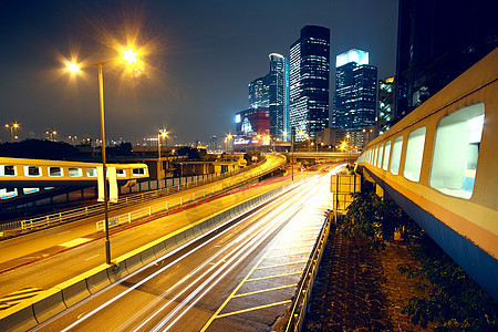 夜间和通过城市交通的都市风景环境过境运动场景运输市中心驾驶曲线建筑车道立交桥图片