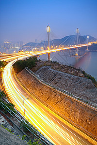 香港深夜交通大桥晚上射线蓝色曲线旅行运输天空地标市中心车辆景观图片