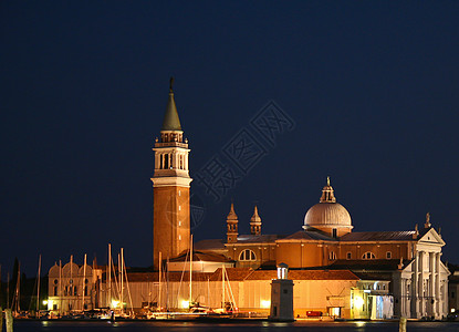意大利威尼斯橙子城市教会风景场所宗教码头土地景观钟楼图片
