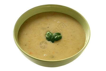 蔬菜汤奶油土豆食物盘子黄色午餐黑色绿色勺子图片