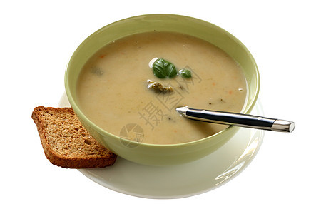 蔬菜汤黄色奶油食物黑色土豆午餐绿色勺子盘子图片